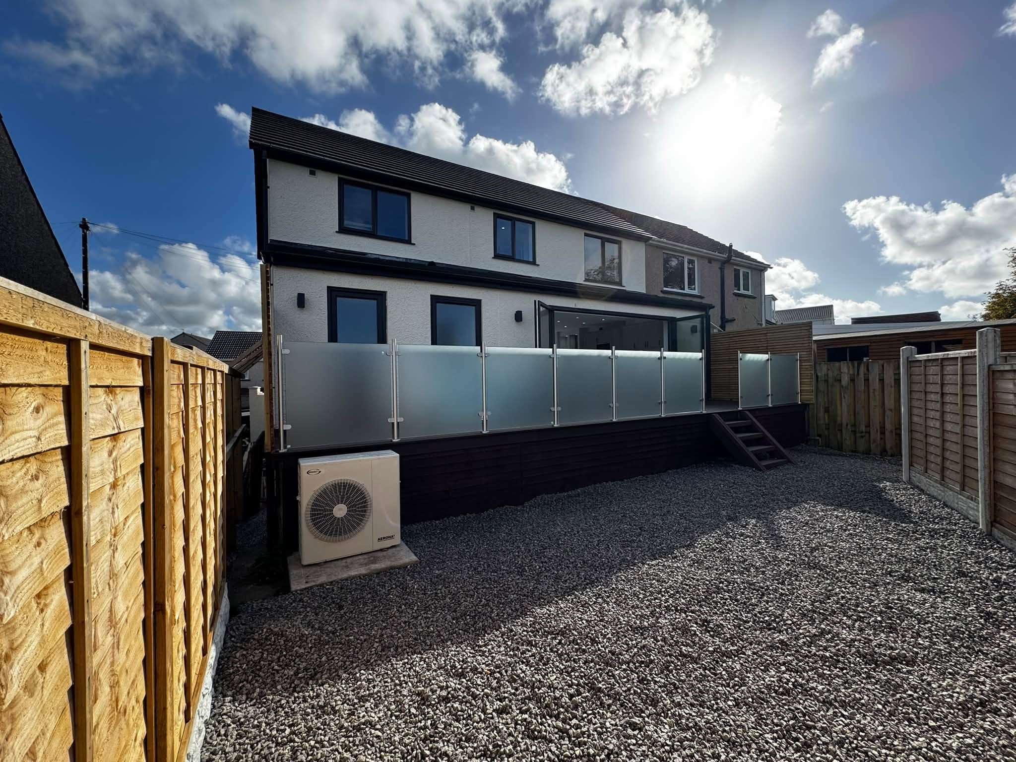 Harrington rear elevation with raised glass-balcony terrace
